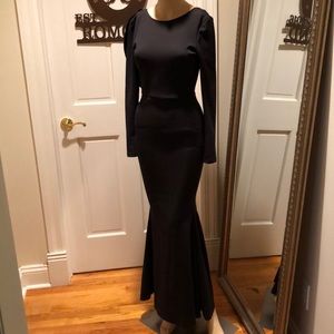 Plunging back line black gown!